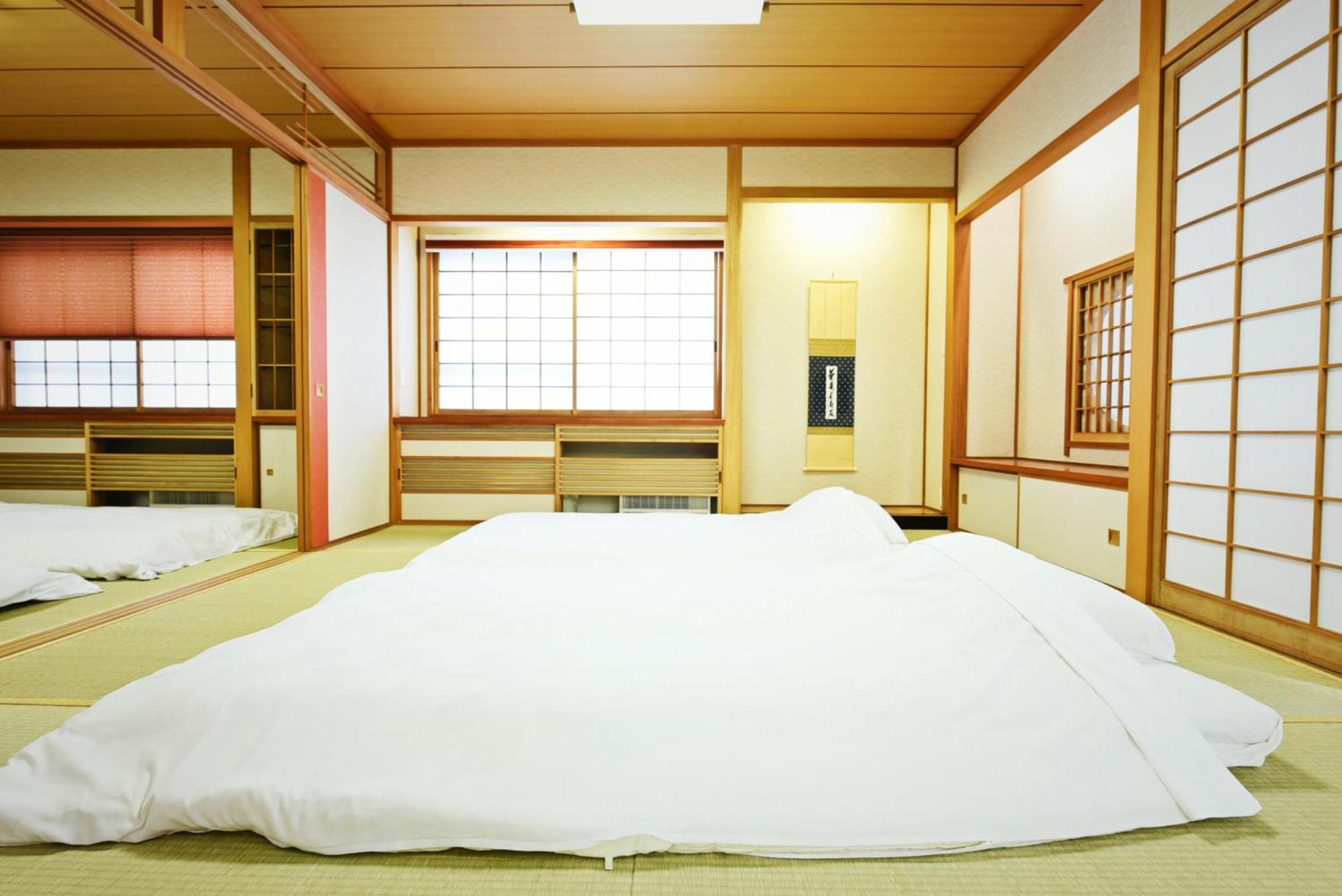 Hostel Pleasure Maruyama Sapporo Quarto foto